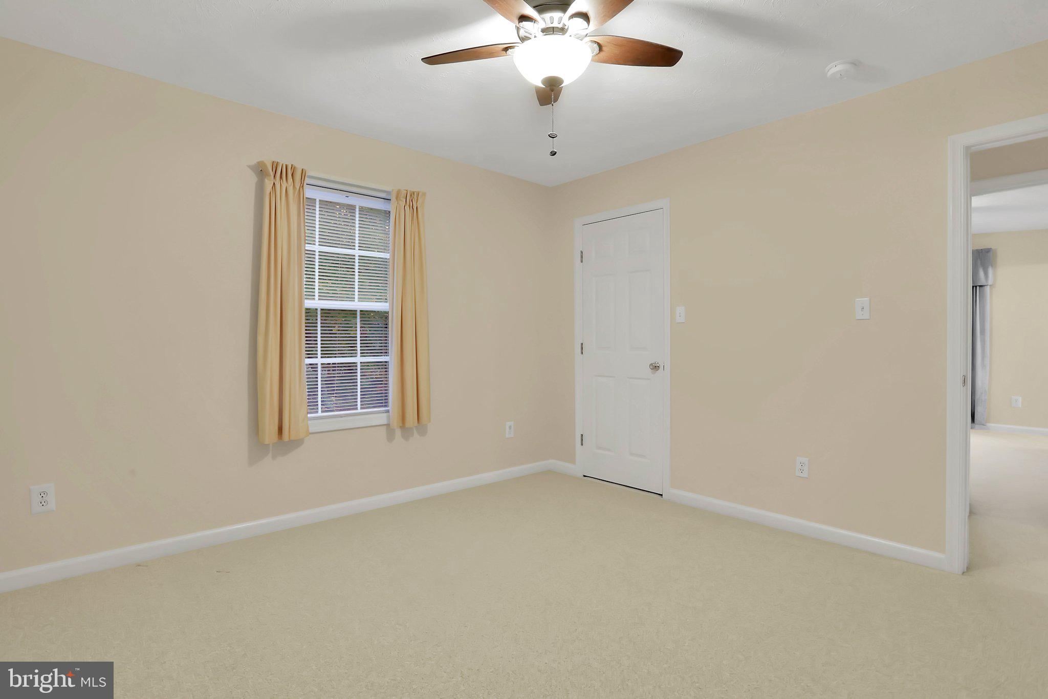 1050 Lower Valley Road Strasburg, VA 22657 - Photo 14 of 34 an empty room with windows and fan