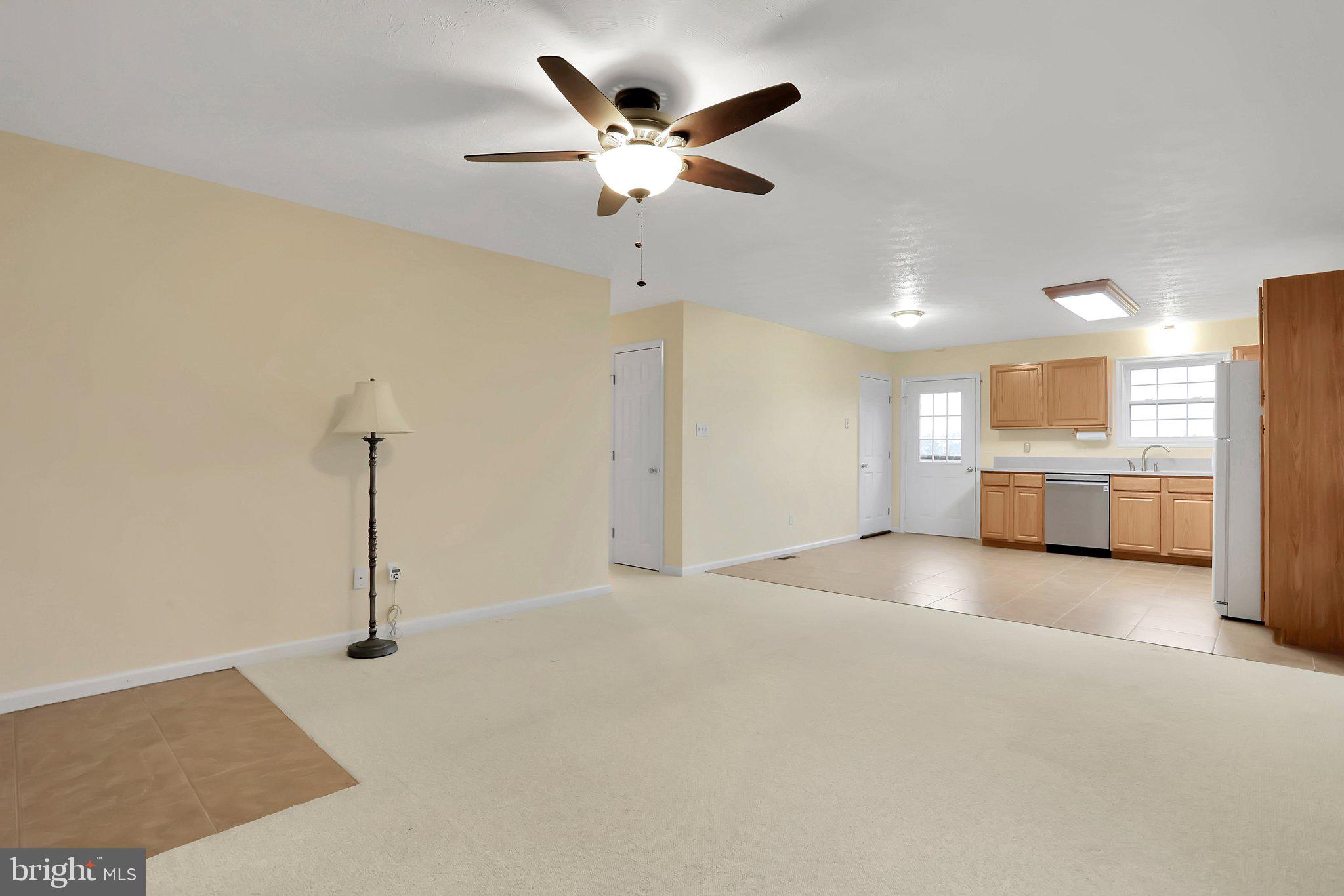 1050 Lower Valley Road Strasburg, VA 22657 - Photo 3 of 34 a view of a kitchen with a sink and a ceiling fan
