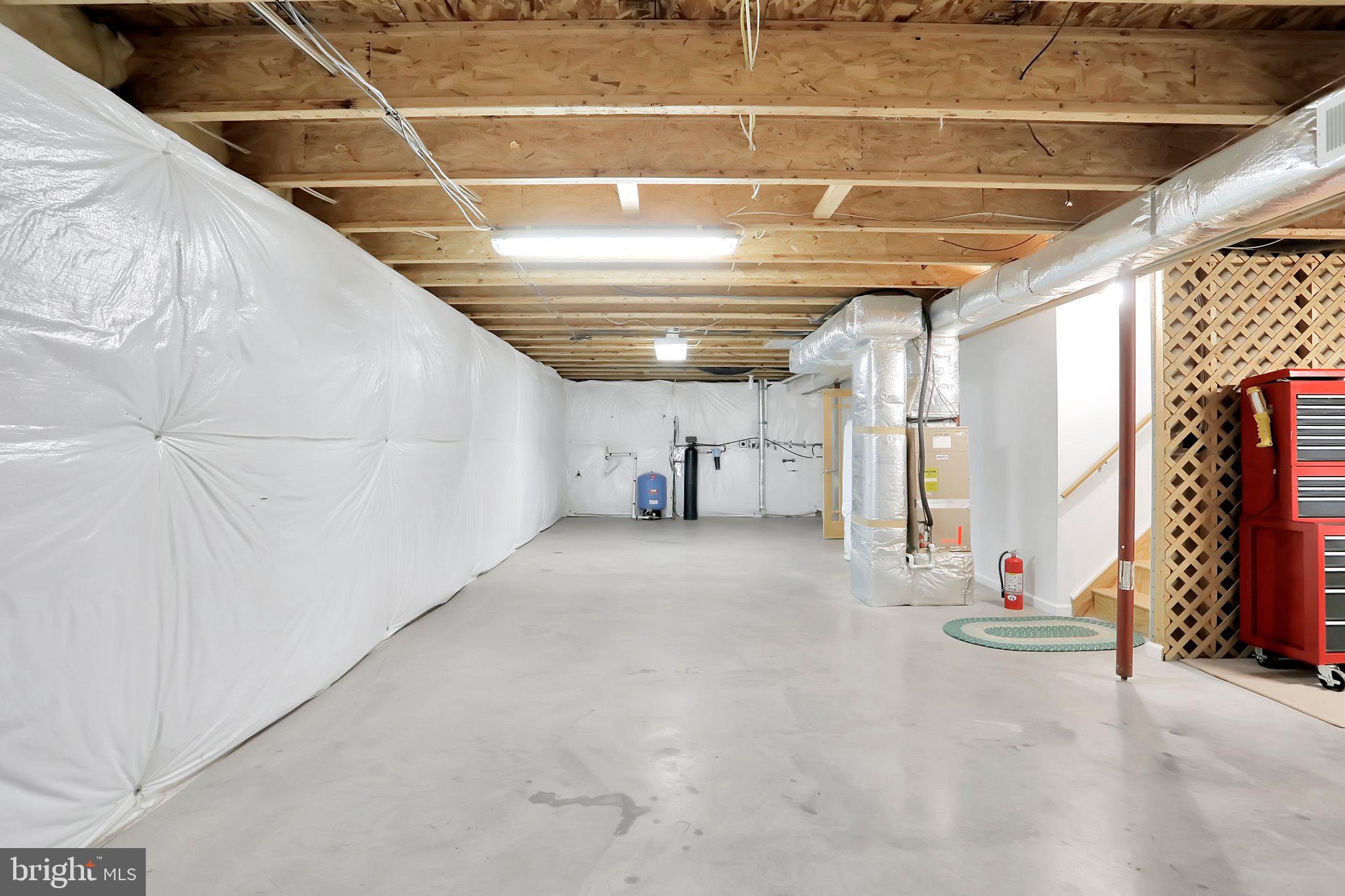 1050 Lower Valley Road Strasburg, VA 22657 - Photo 22 of 34 a view of empty room with wooden floor and windows