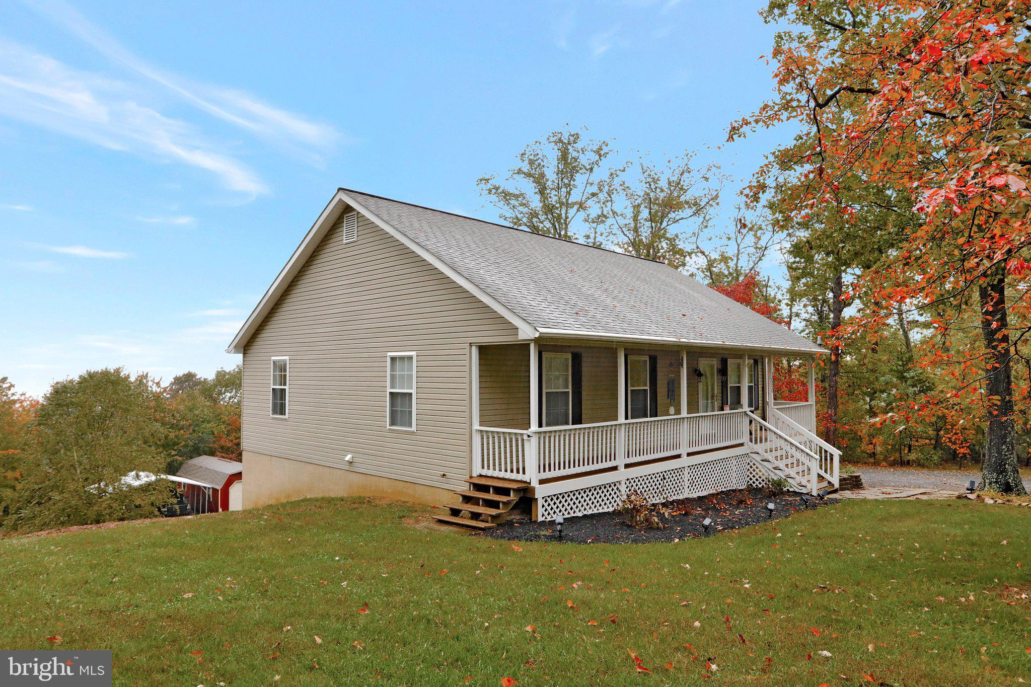 1050 Lower Valley Road Strasburg, VA 22657 - Photo 28 of 34 a view of backyard with a garden and deck
