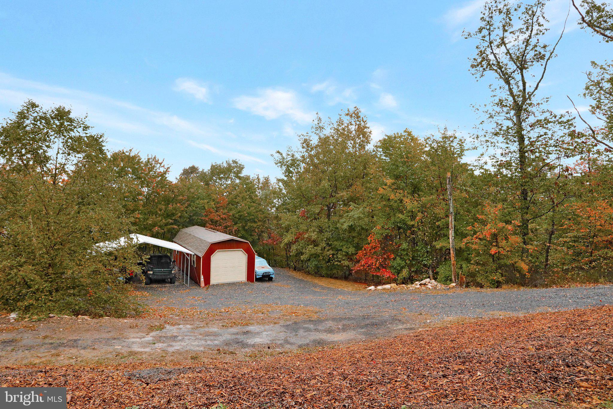 1050 Lower Valley Road Strasburg, VA 22657 - Photo 29 of 34 a view of a yard with a house and a road