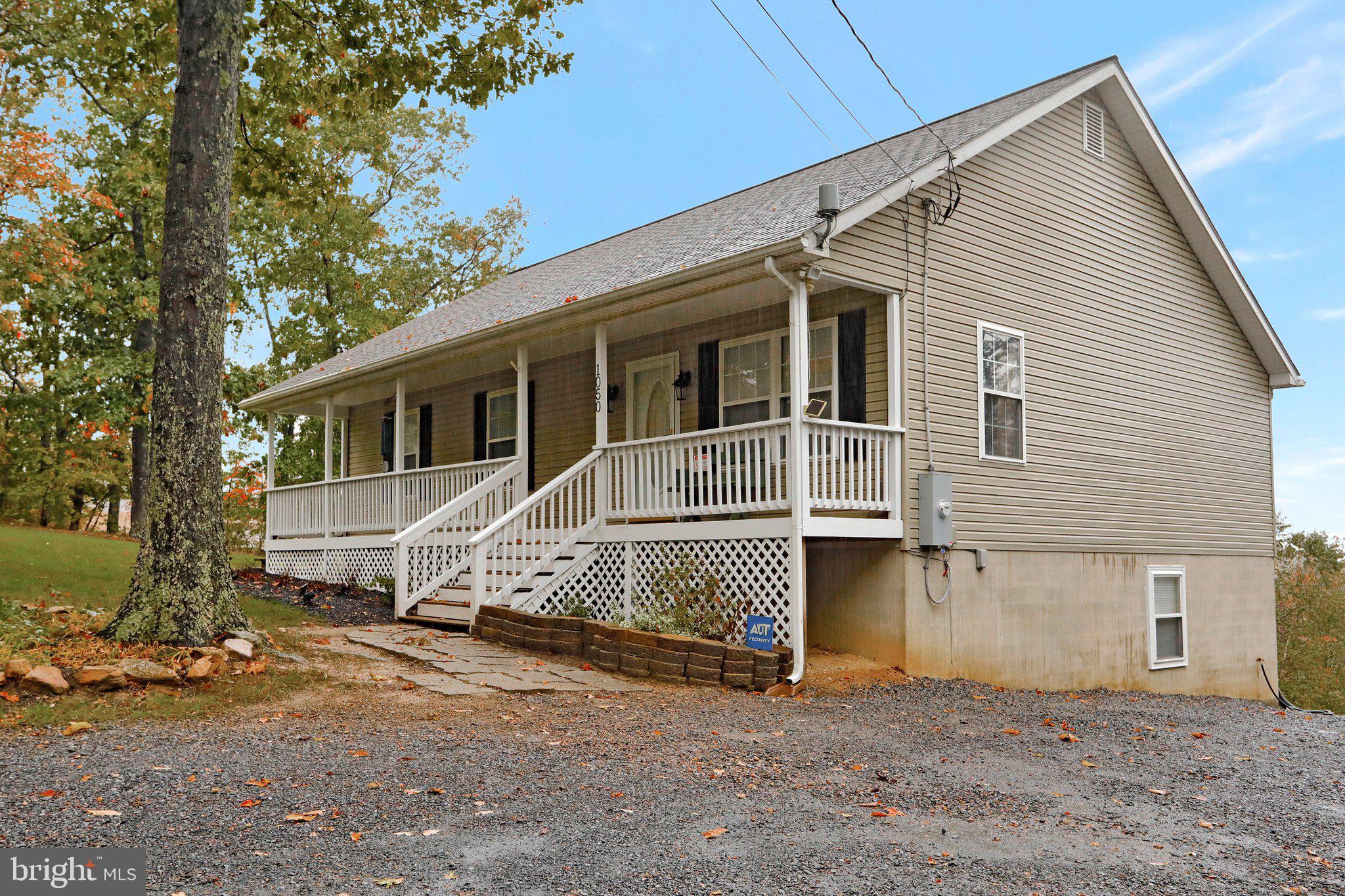 1050 Lower Valley Road Strasburg, VA 22657 - Photo 30 of 34 a view of a house with a yard