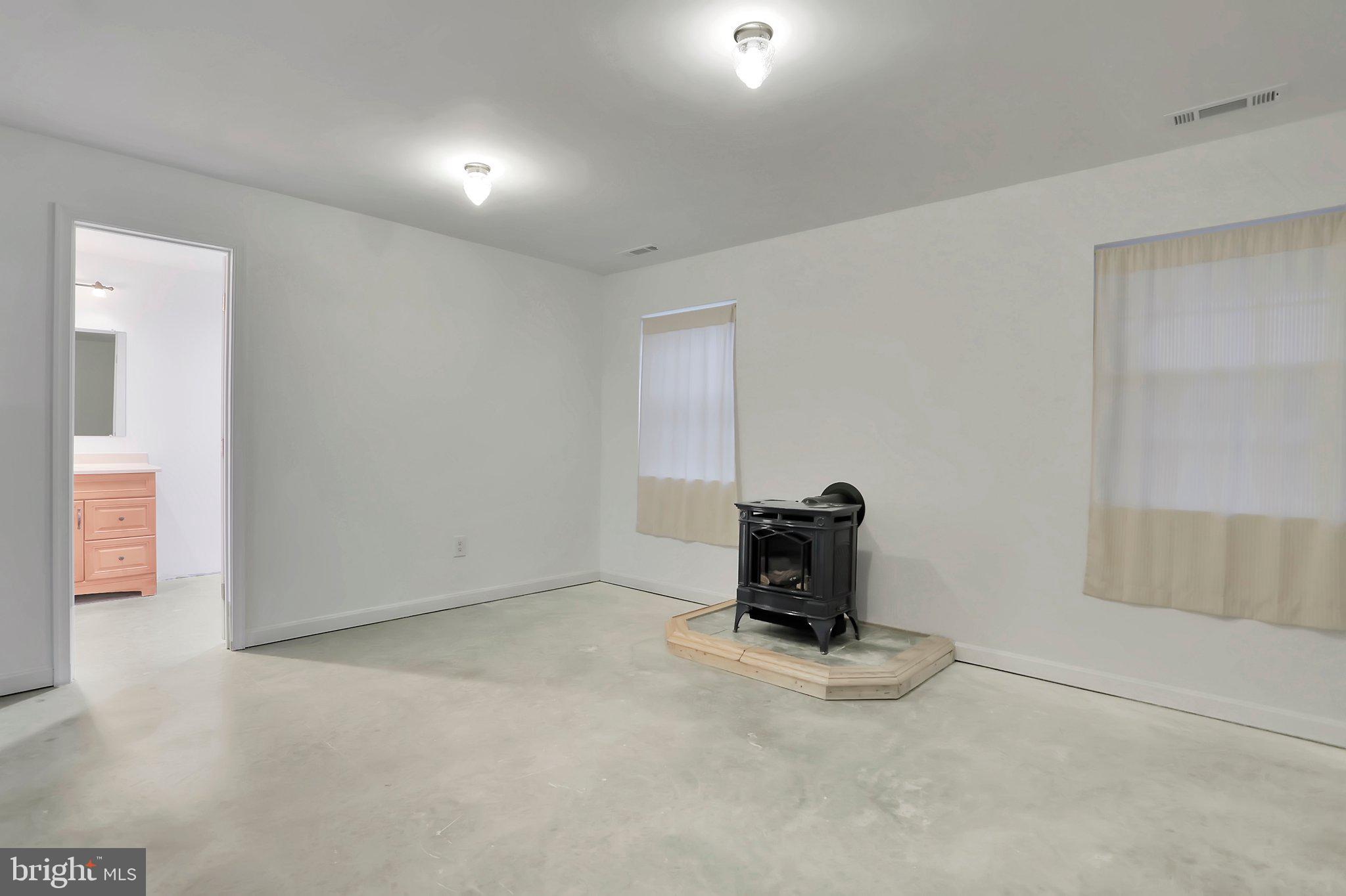 1050 Lower Valley Road Strasburg, VA 22657 - Photo 31 of 34 an empty room with a bench