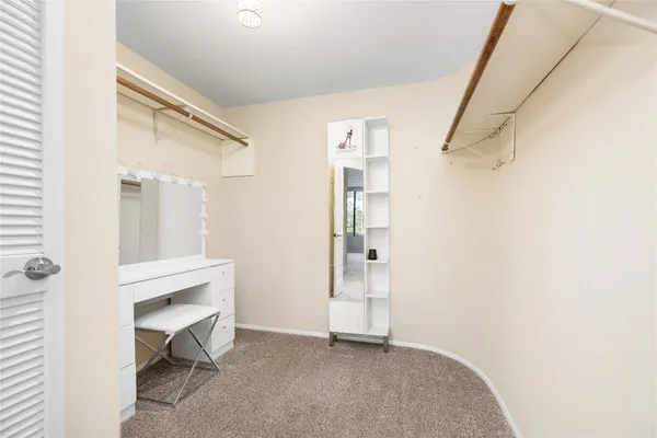 a bathroom with a bathtub and a toilet
