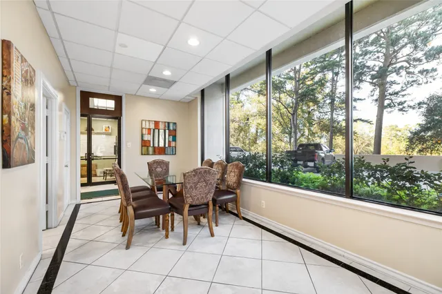 a kitchen with stainless steel appliances a stove a sink and a refrigerator