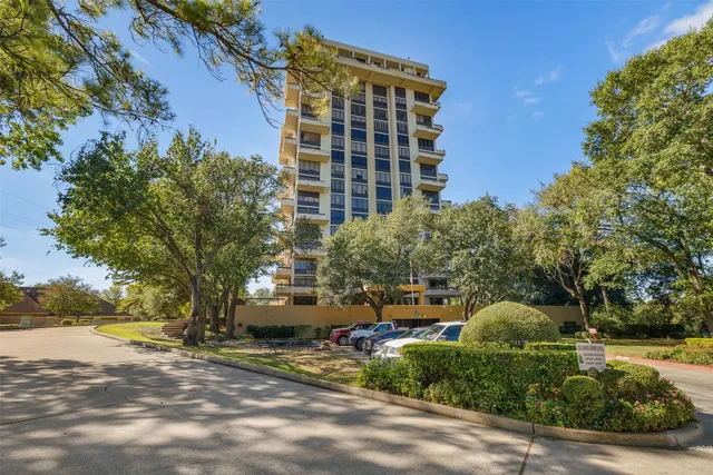 a view of a city with tall buildings