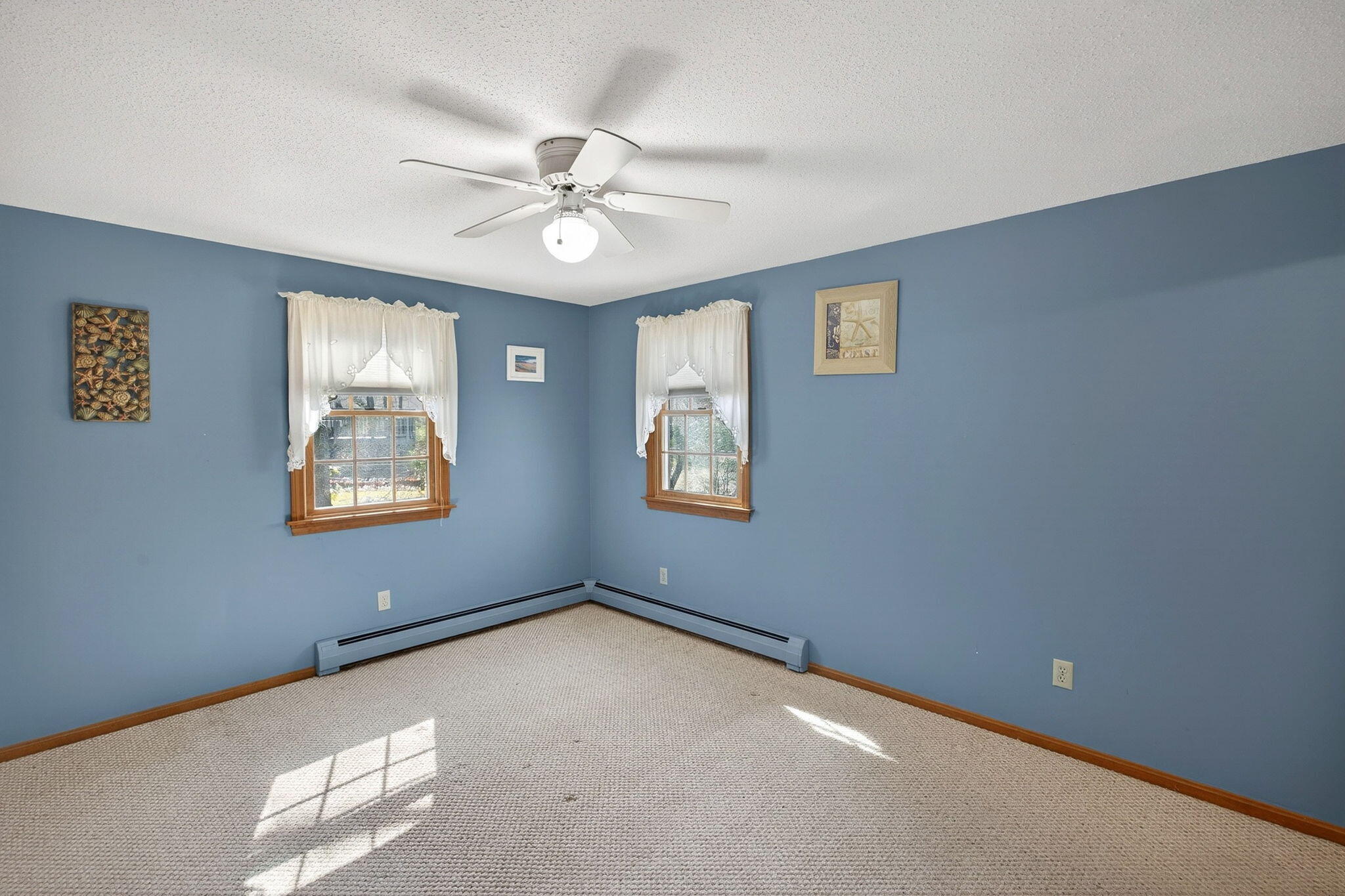12 Inkberry Lane Harwich, MA 02645 - Photo 14 of 41 a view of an empty room with a window