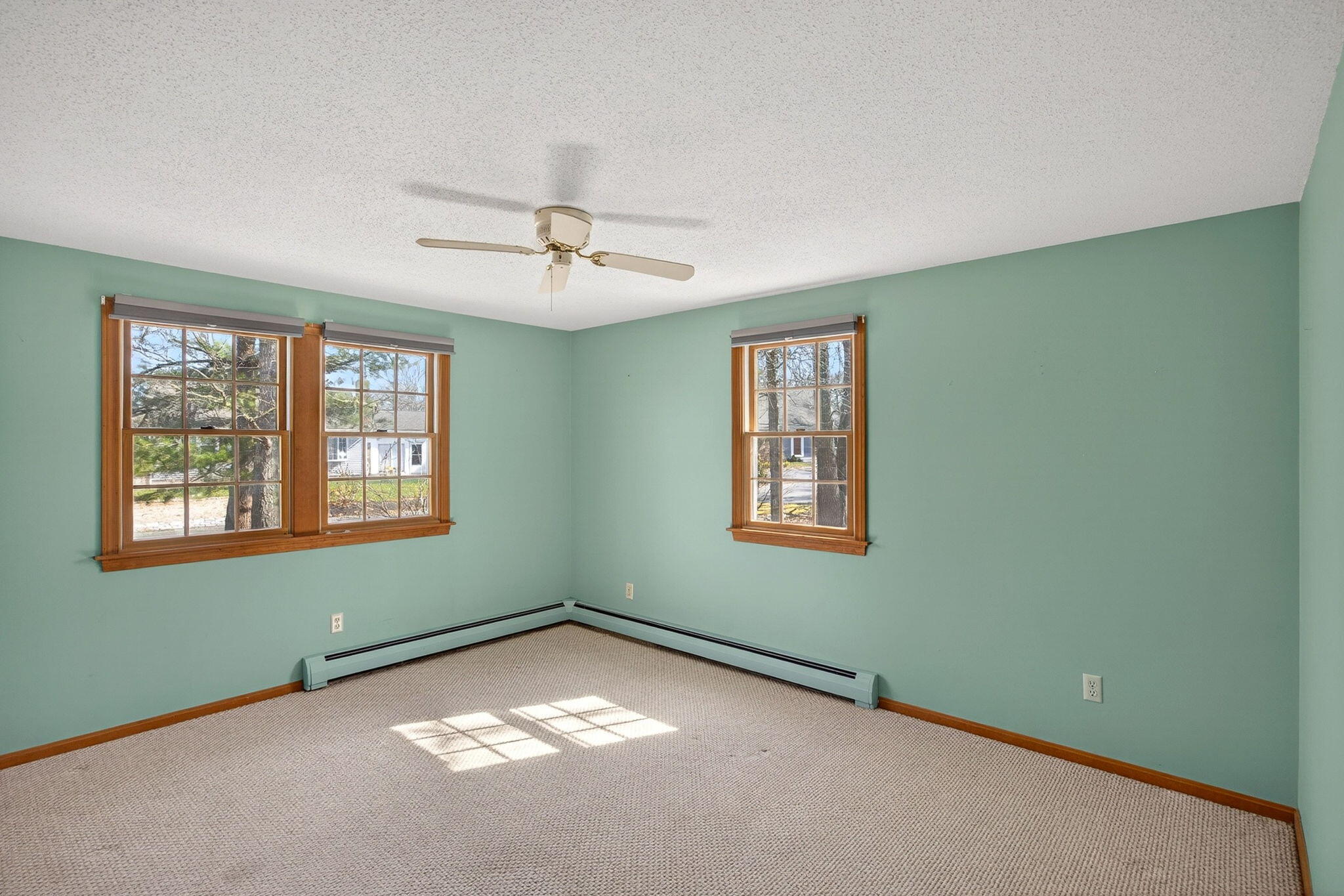 12 Inkberry Lane Harwich, MA 02645 - Photo 17 of 41 a view of an empty room with a window
