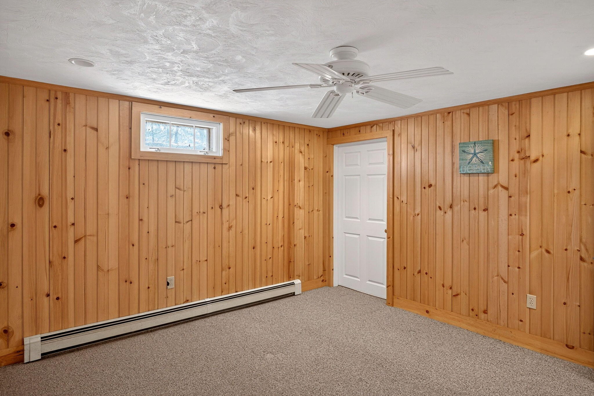 12 Inkberry Lane Harwich, MA 02645 - Photo 26 of 41 an empty room with windows and fan