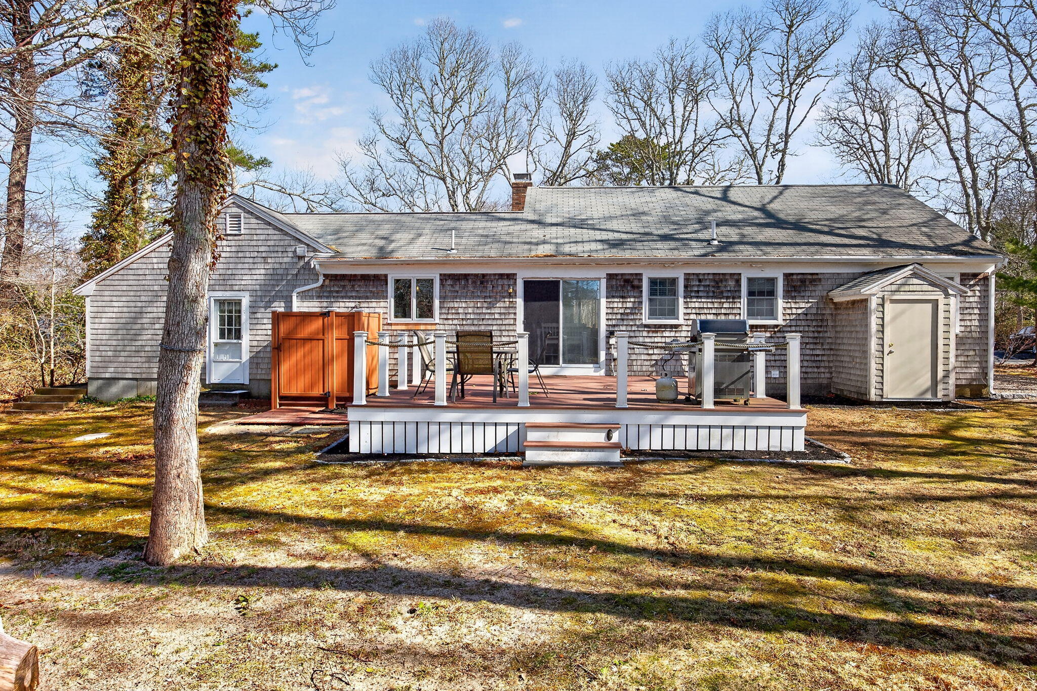 12 Inkberry Lane Harwich, MA 02645 - Photo 29 of 41 a view of a house with swimming pool and porch with furniture