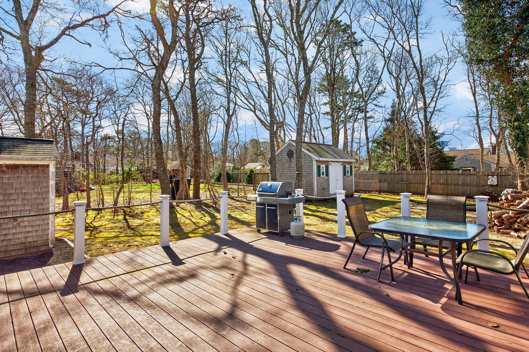 12 Inkberry Lane Harwich, MA 02645 - Photo 32 of 41 a view of a chairs and table on the wooden floor