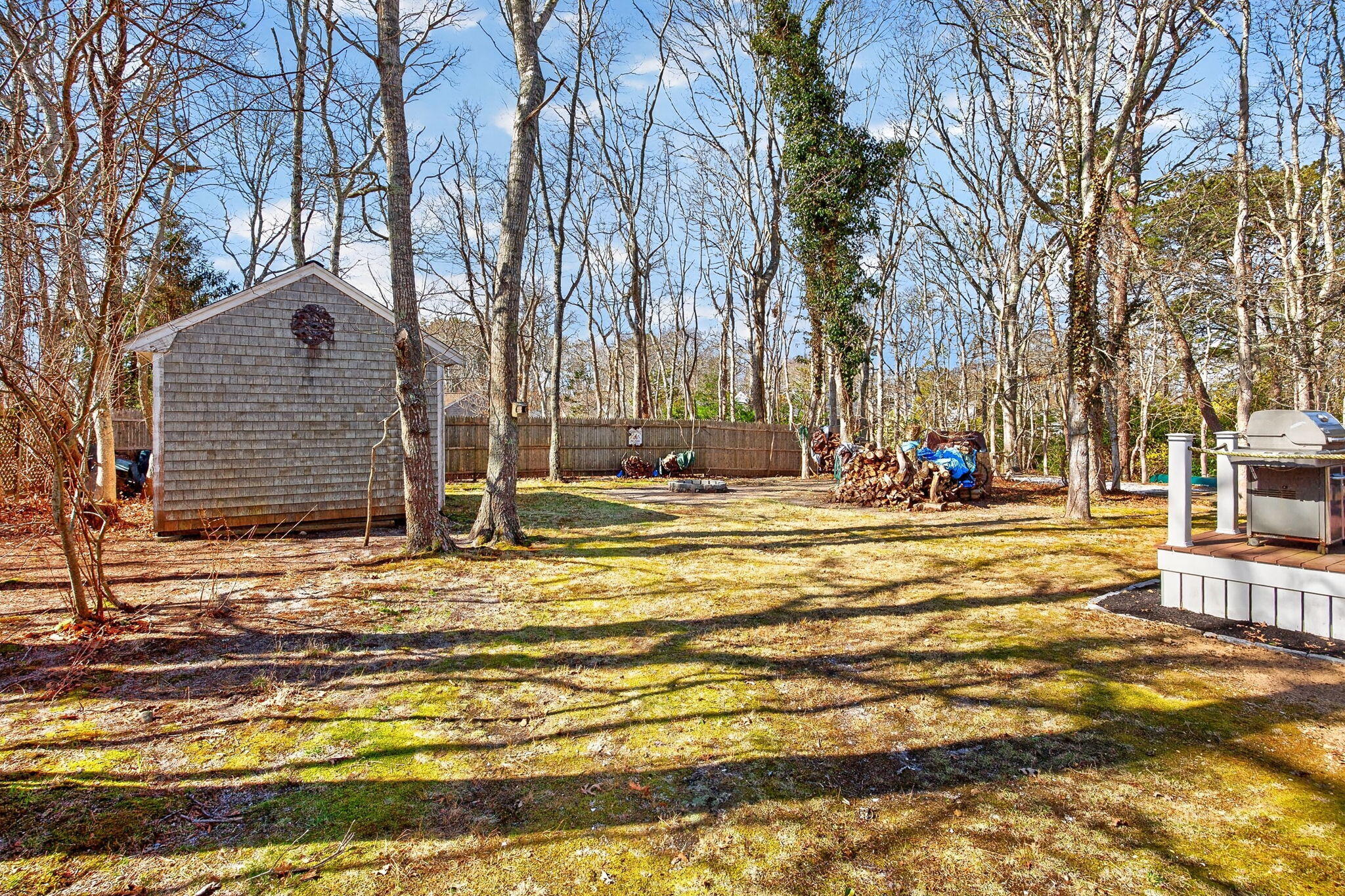 12 Inkberry Lane Harwich, MA 02645 - Photo 38 of 41 a view of road with large trees