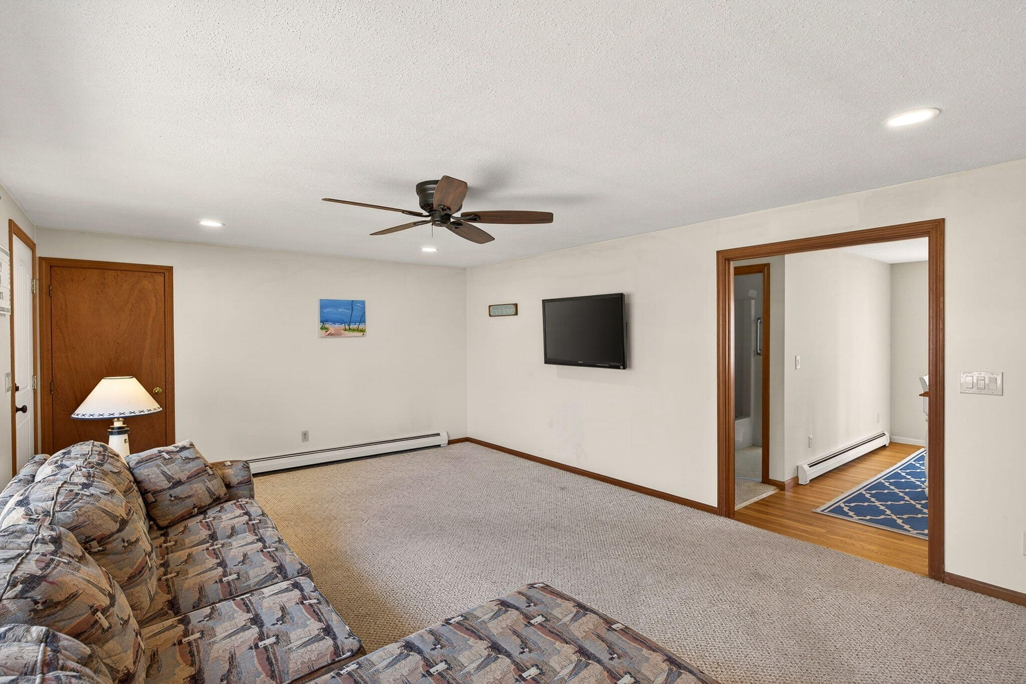 12 Inkberry Lane Harwich, MA 02645 - Photo 7 of 41 a bedroom with a large bed and a window