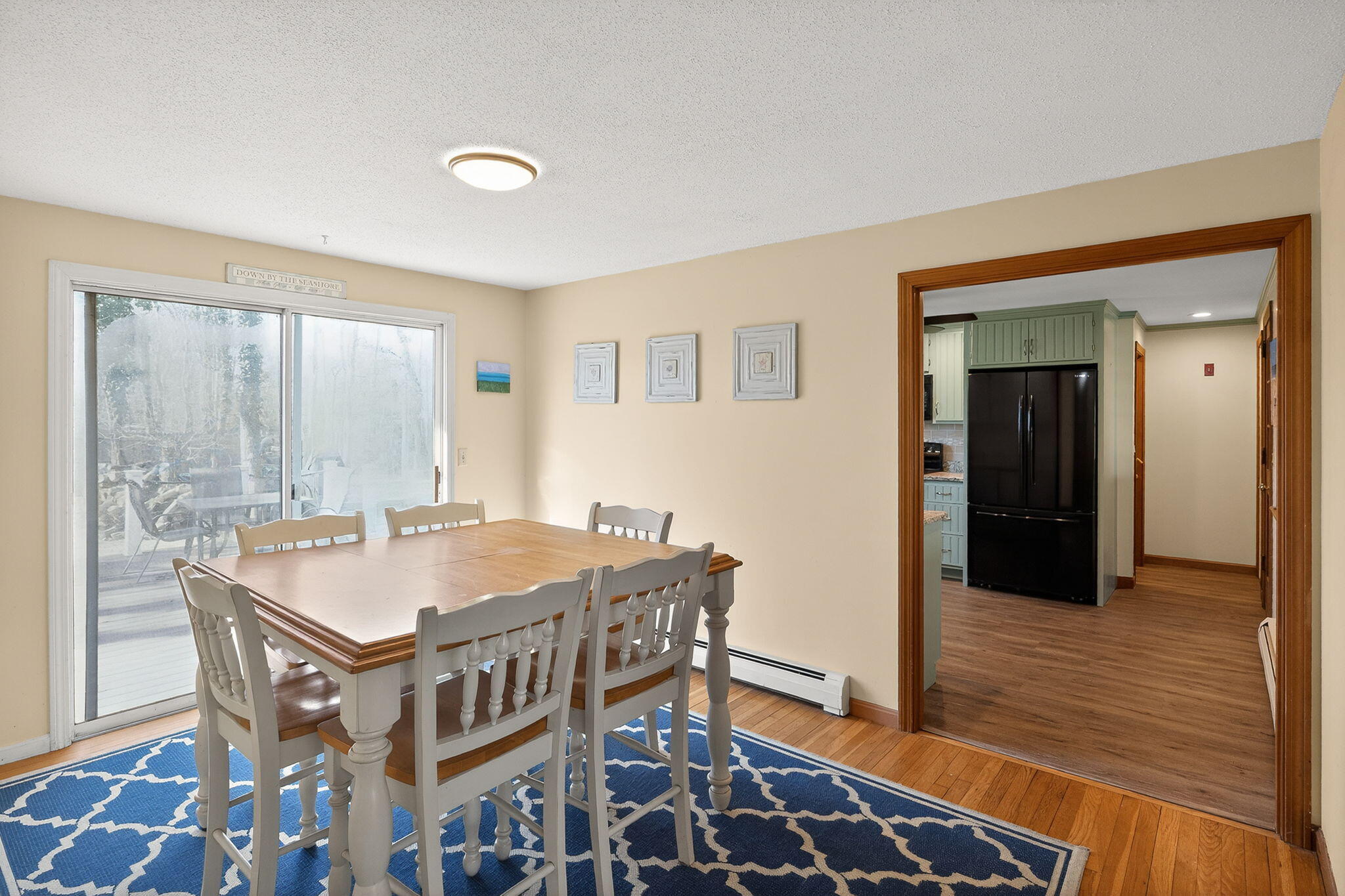 12 Inkberry Lane Harwich, MA 02645 - Photo 9 of 41 a very nice looking dining room with a table and chairs