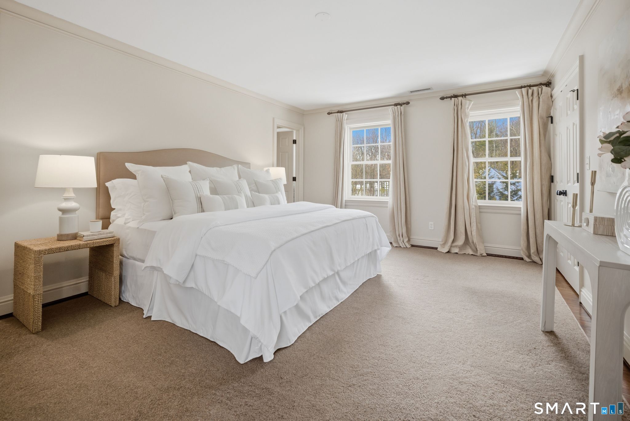 1380 Old Academy Road Fairfield, CT 06824 - Photo 26 of 39 a spacious bedroom with a bed and a cabinets