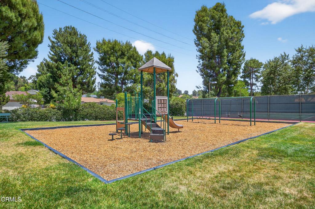 27127 Rio Bosque Drive Valencia, CA 91354 - Photo 10 of 11 a view of a backyard with swimming pool