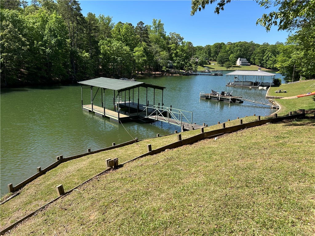 43 Sunset Cove Road Abbeville, SC 29620 - Photo 1 of 41 This tranquil waterfront property features a private dock, offering direct access to scenic lake views.
