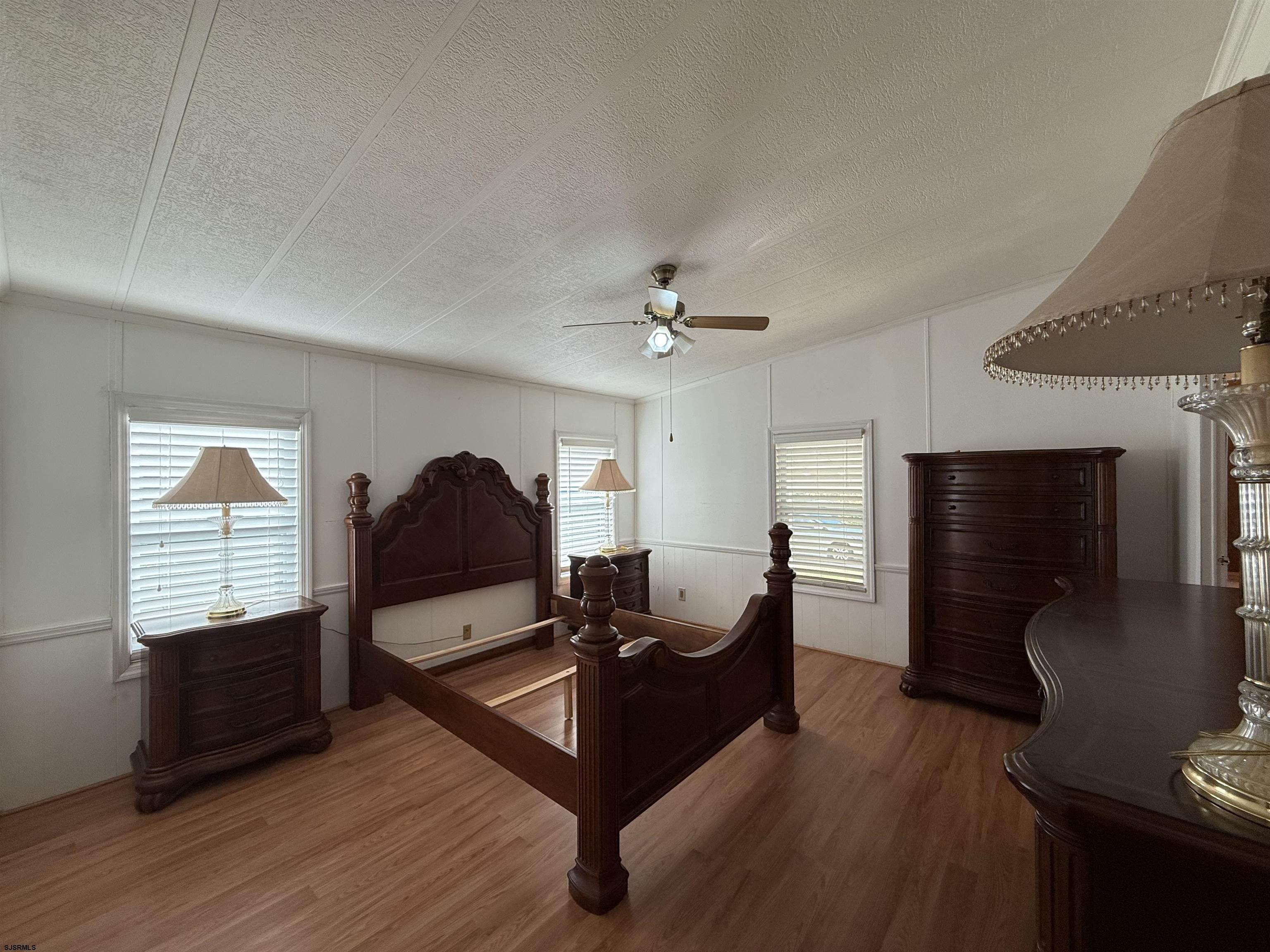 386 Indian Way Buena, NJ 08310 - Photo 13 of 37 a living room with furniture and a flat screen tv
