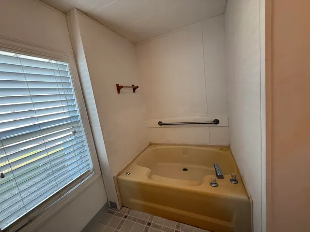 a bathroom with a bathtub