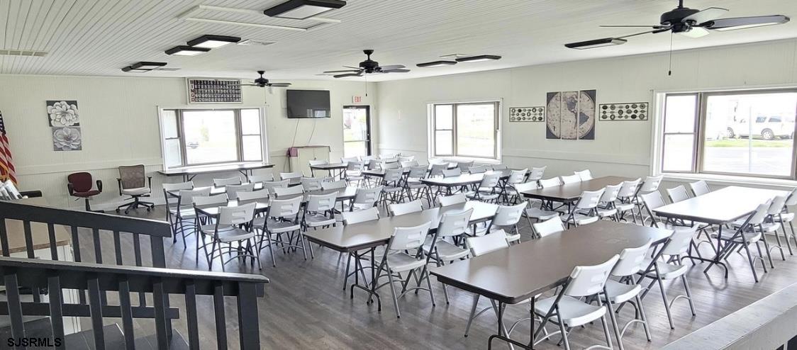 386 Indian Way Buena, NJ 08310 - Photo 33 of 37 a view of a dining room with furniture and wooden floor