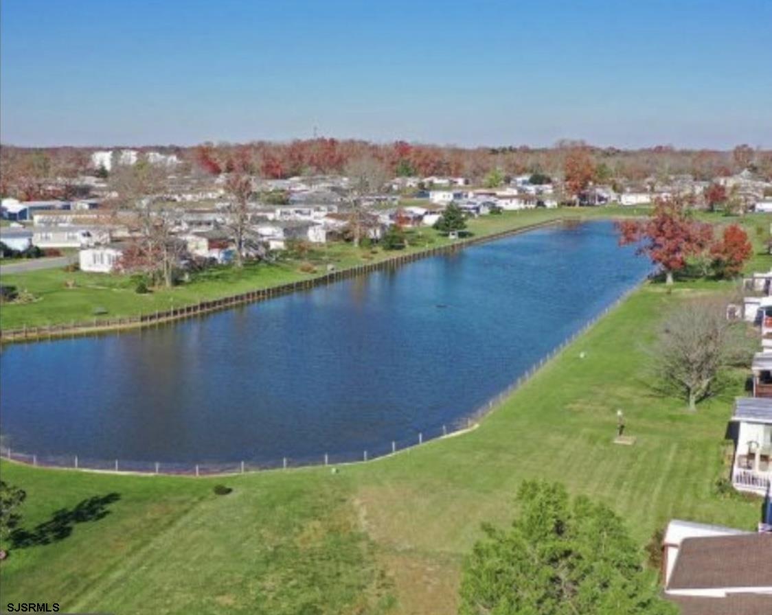 386 Indian Way Buena, NJ 08310 - Photo 35 of 37 an aerial view of residential houses with outdoor space and river