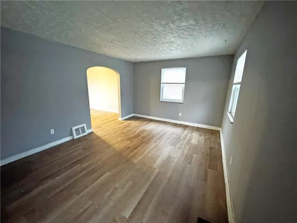 an empty room with windows