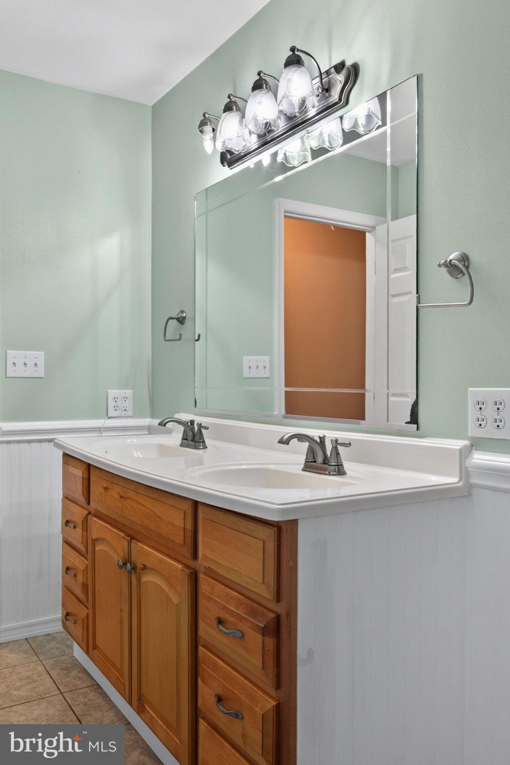 2634 Pleasant Hill Road Hanover, PA 17331 - Photo 32 of 52 Elegant dual-sink bathroom retreat.