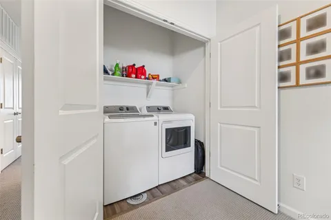 a utility room with washer and dryer