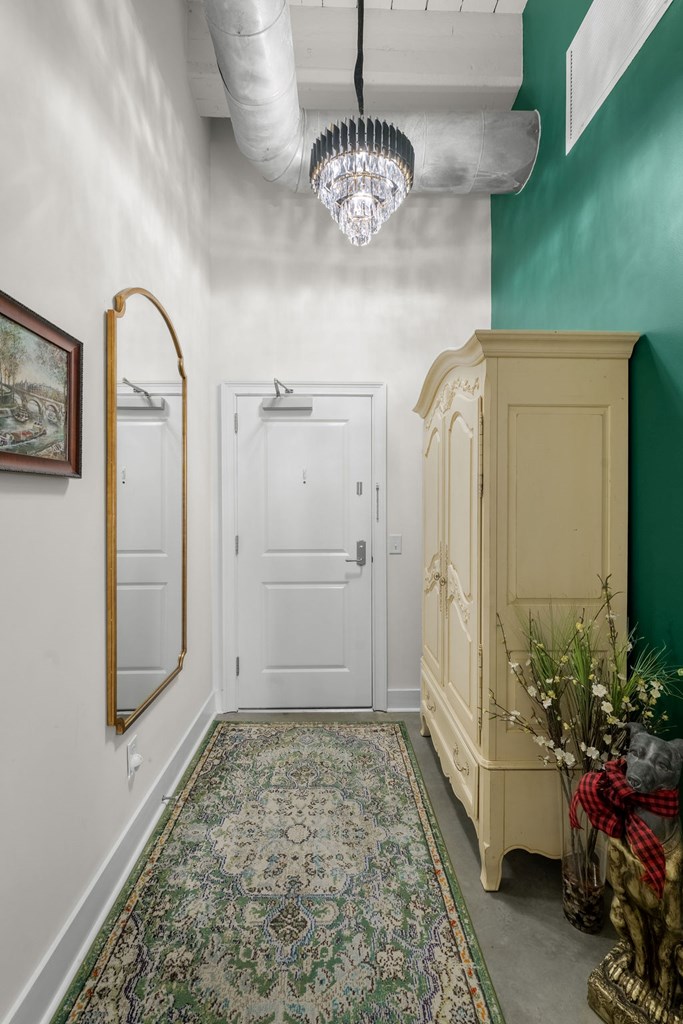 1201 Front Avenue, Unit 322 Columbus, GA 31901 - Photo 40 of 54 a view of a hallway to a house