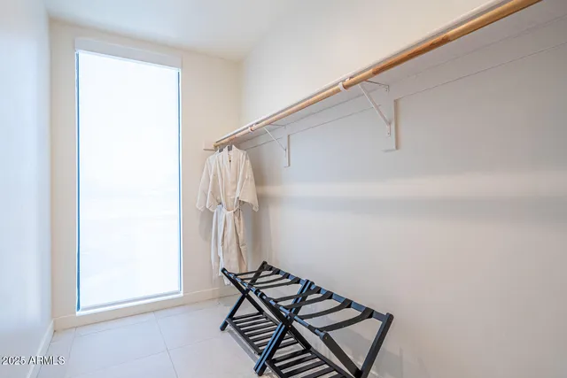 a view of a room with rack on the wall