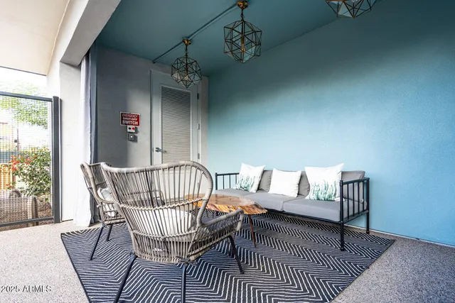 a view of swimming pool with a patio