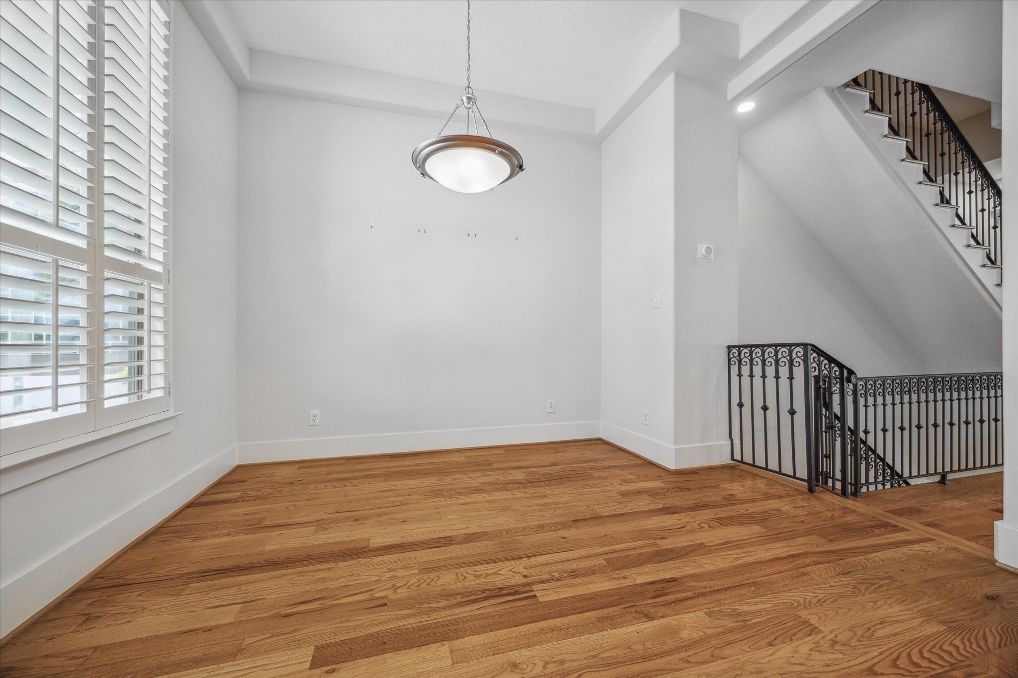 1468 California Street Houston, TX 77006 - Photo 9 of 23 The Dining Area is located off the Living Area & Kitchen. This area gets flooded with natural light through the large windows.