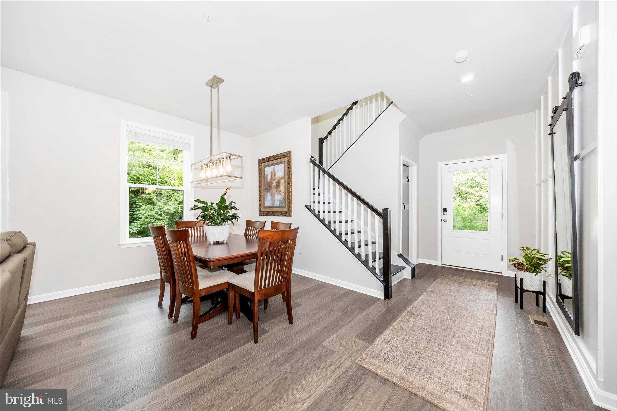 700 Bond Street Frederick, MD 21701 - Photo 5 of 49 a view of a dining room with furniture window and wooden floor