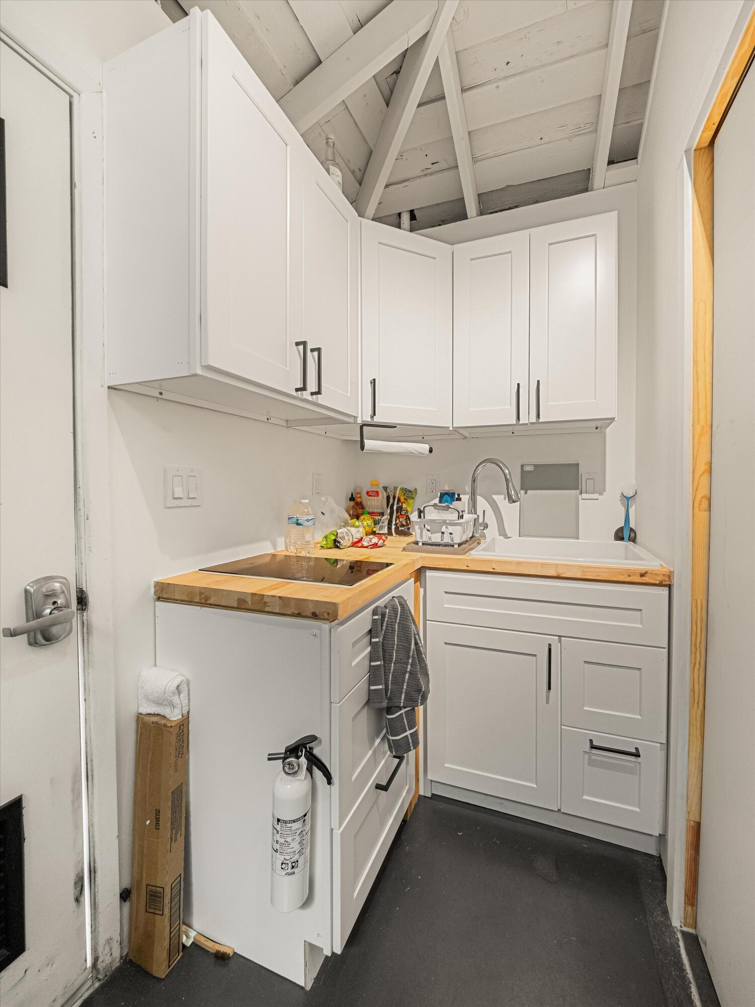 6724 Pasado Road Goleta, CA 93117 - Photo 19 of 24 a utility room with cabinets washer and dryer