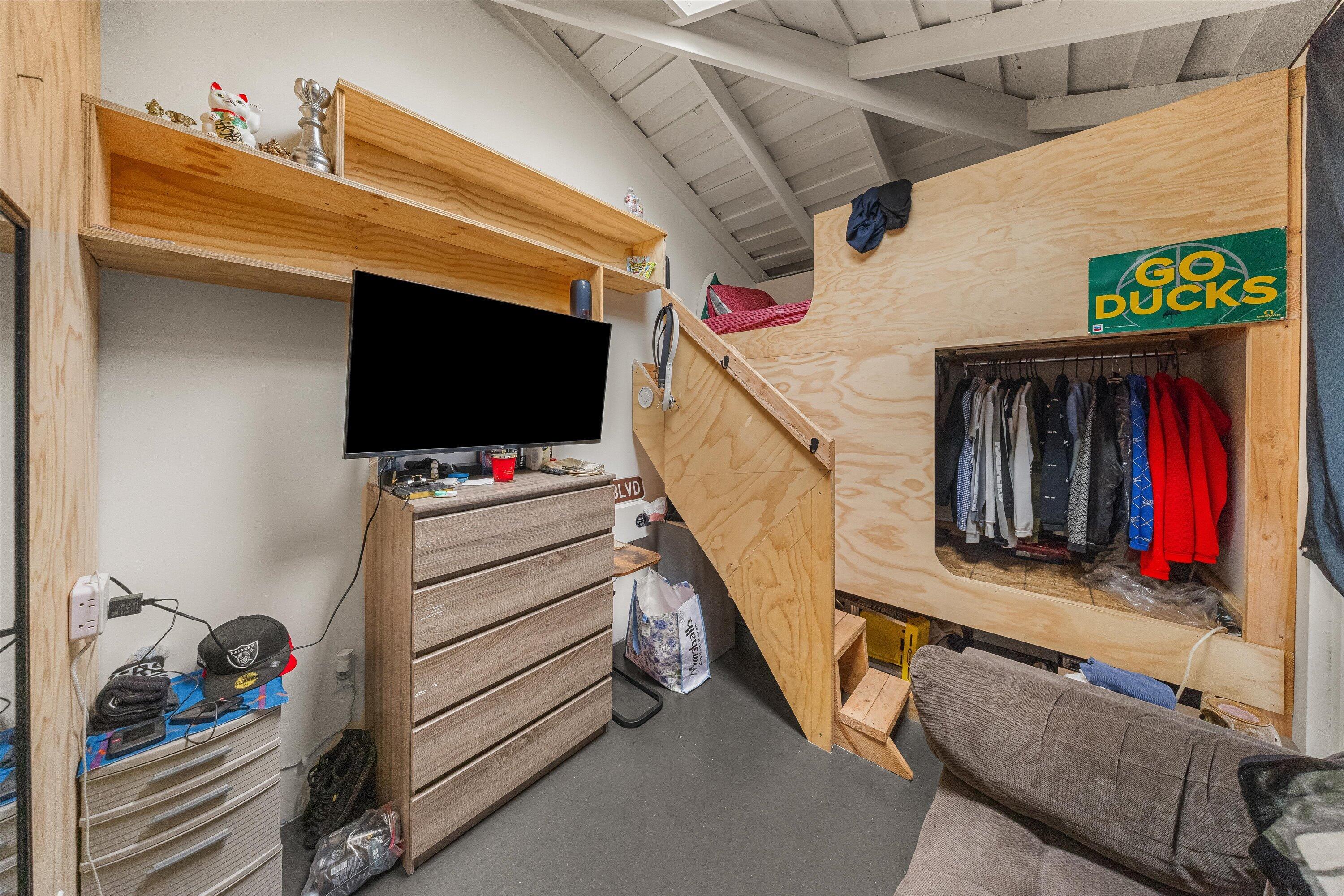 6724 Pasado Road Goleta, CA 93117 - Photo 20 of 24 a view of walk in closet with clothes and shoes