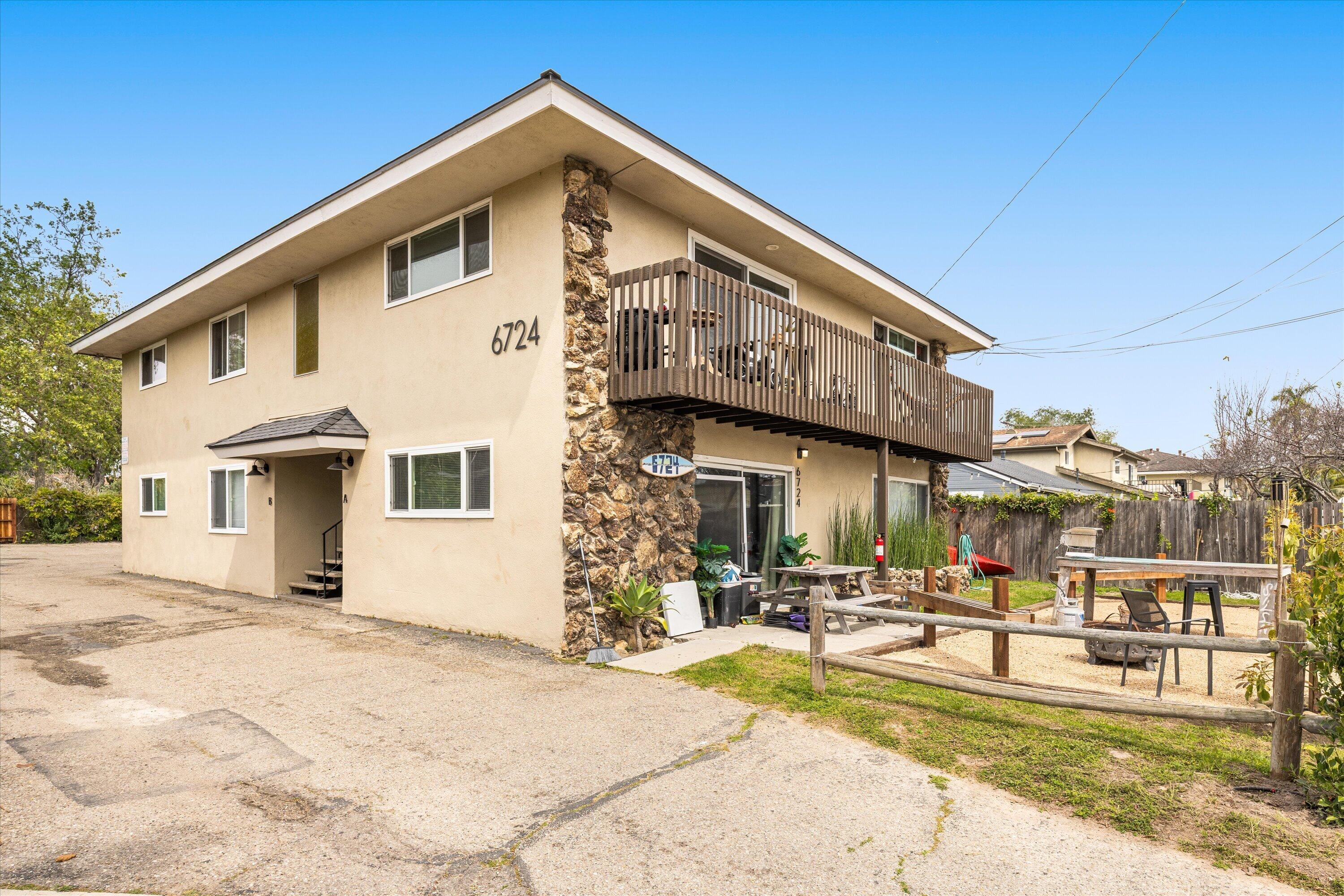 6724 Pasado Road Goleta, CA 93117 - Photo 3 of 24 a view of a white building with a large windows