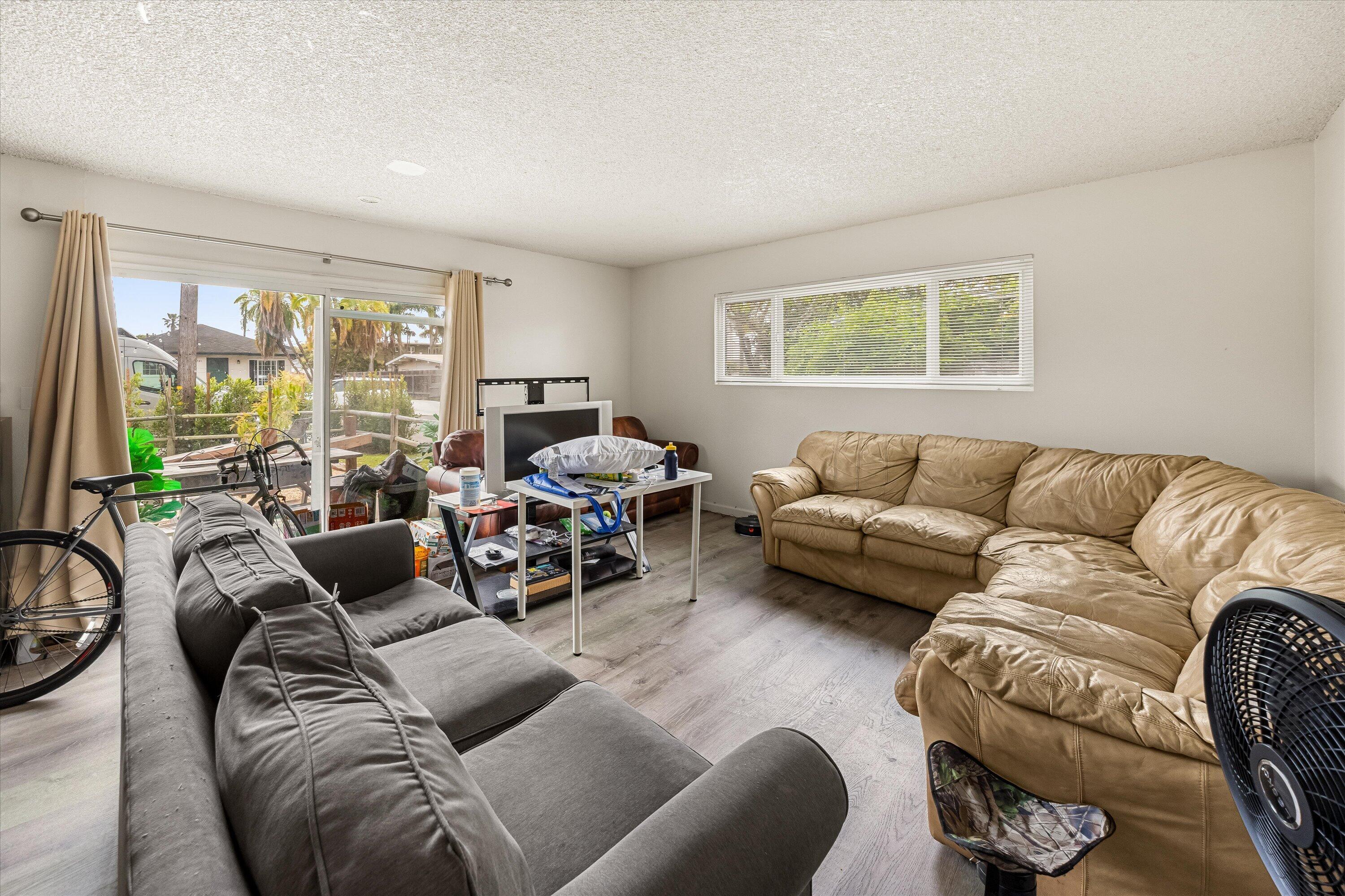 6724 Pasado Road Goleta, CA 93117 - Photo 6 of 24 a living room with furniture and a large window