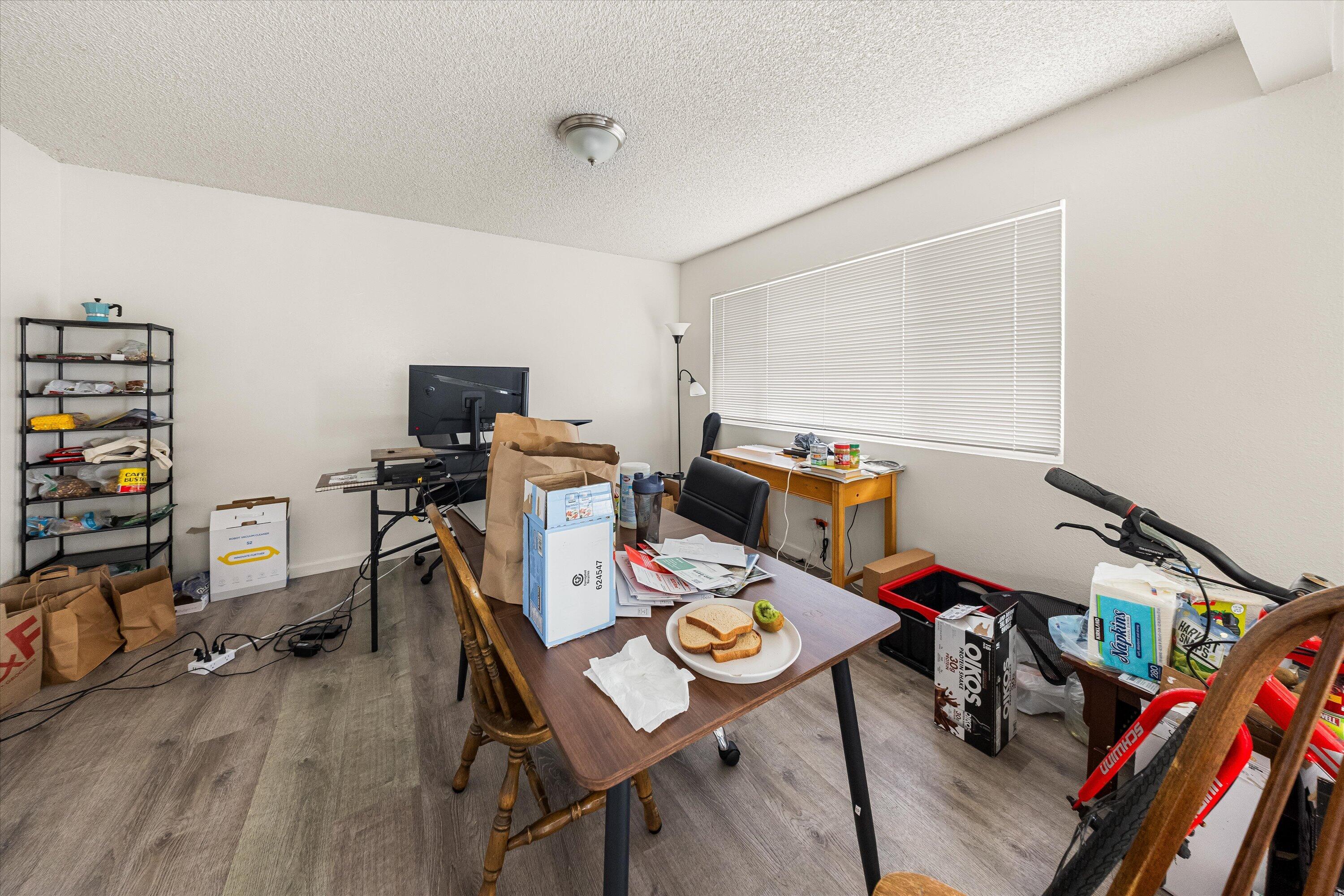 6724 Pasado Road Goleta, CA 93117 - Photo 8 of 24 a view of a workspace with furniture and wooden floor