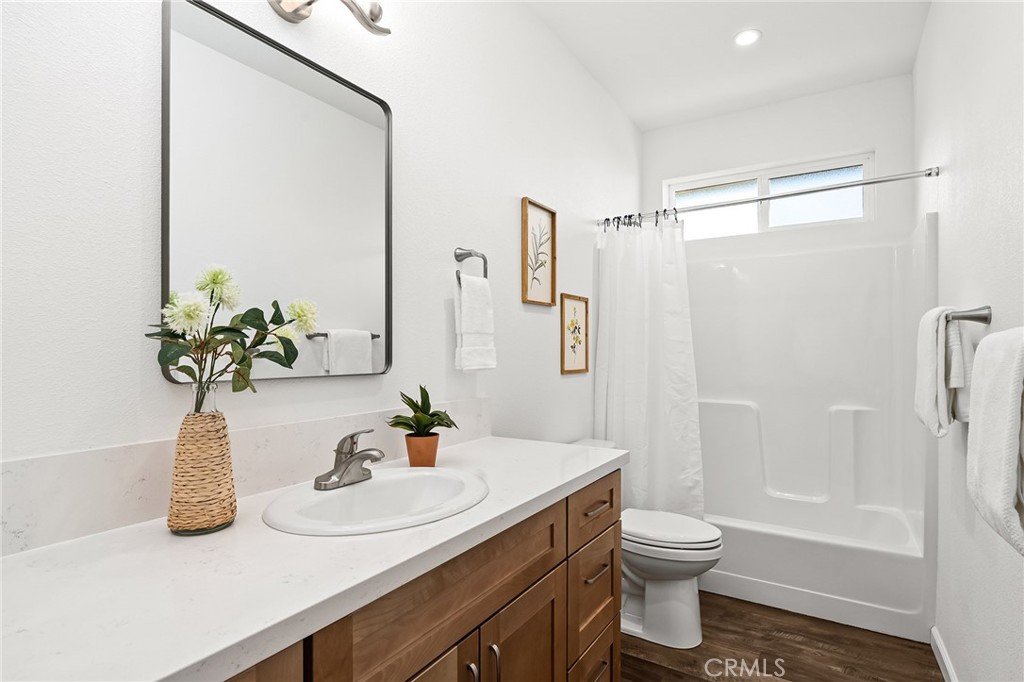 6078 Maxwell Drive Paradise, CA 95969 - Photo 18 of 44 a bathroom with a sink a toilet and shower