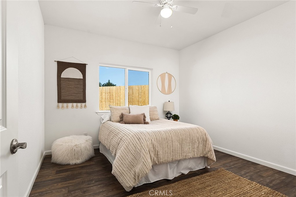 6078 Maxwell Drive Paradise, CA 95969 - Photo 20 of 44 a bedroom with a bed and window