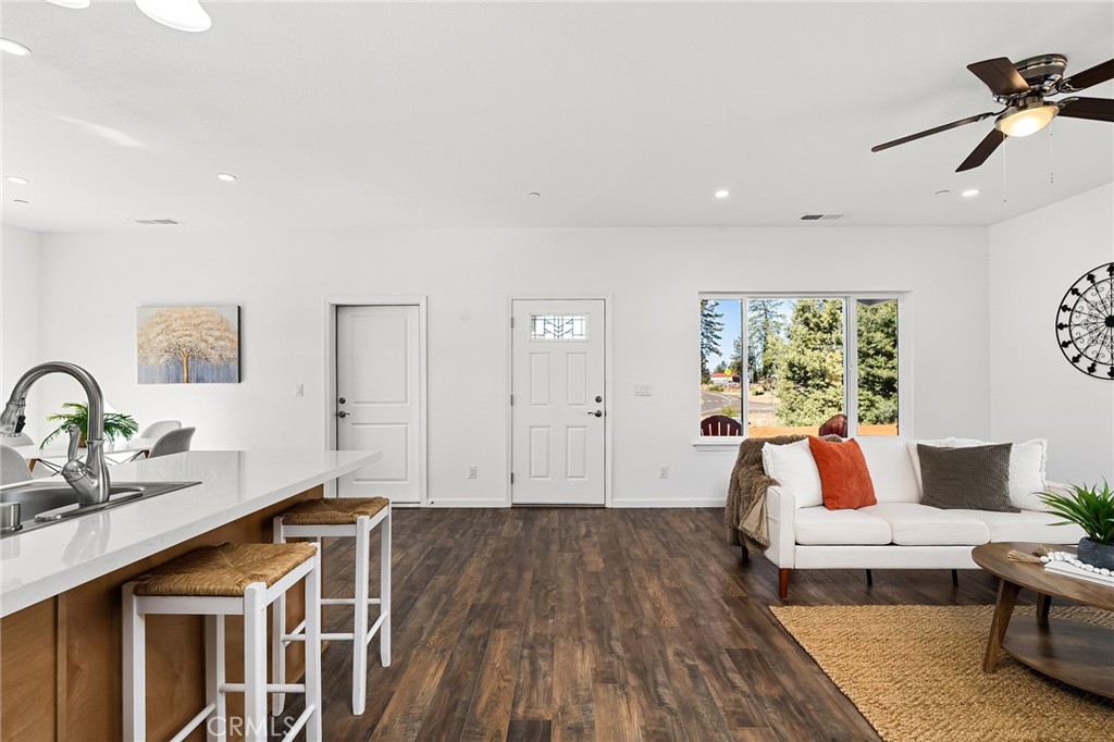 6078 Maxwell Drive Paradise, CA 95969 - Photo 6 of 44 a living room with furniture and a wooden floor