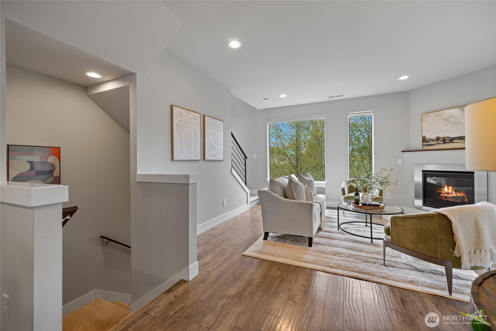 24903 123rd Place Southeast Kent, WA 98030 - Photo 12 of 40 a living room with fireplace furniture and a wooden floor