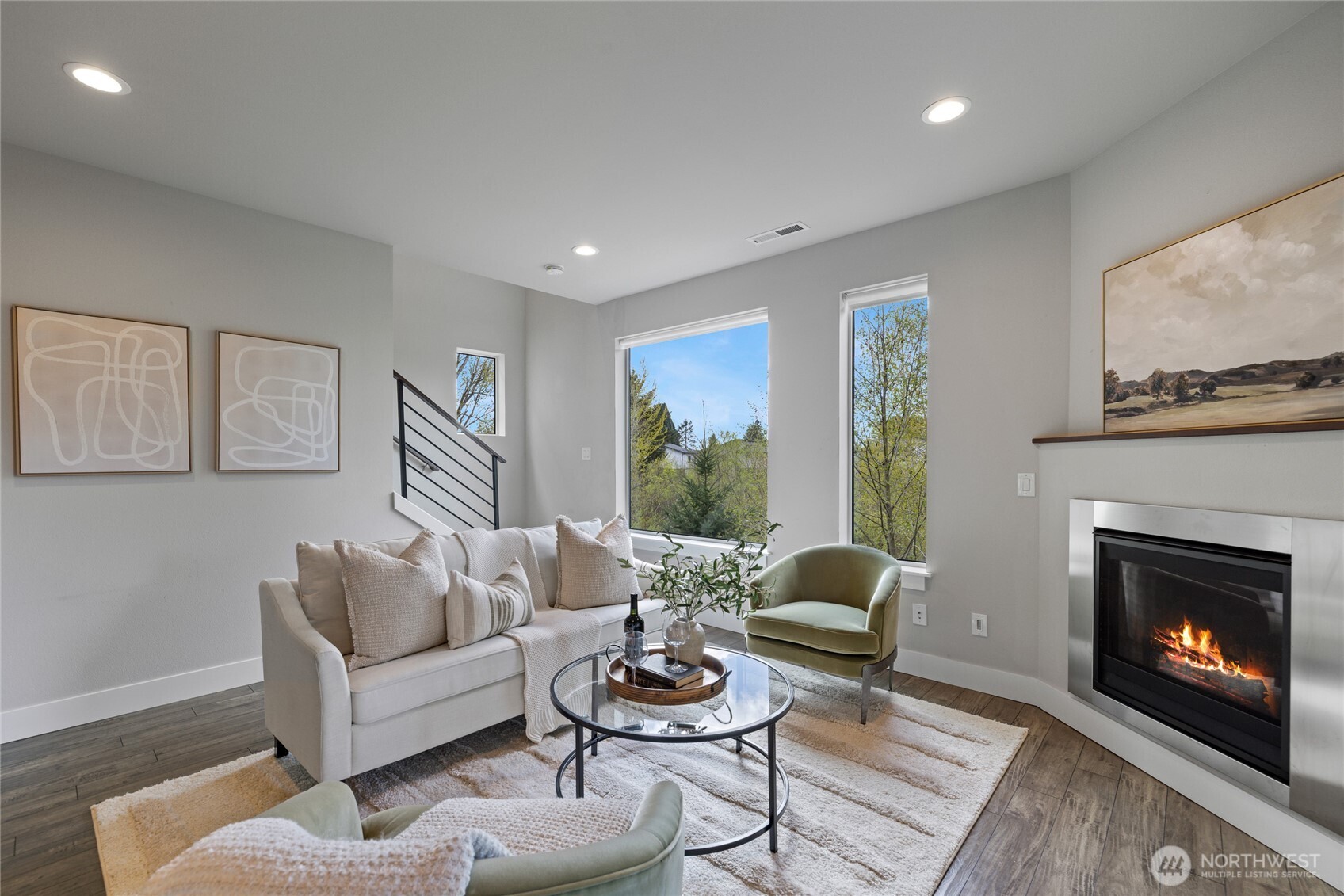 24903 123rd Place Southeast Kent, WA 98030 - Photo 16 of 40 a living room with furniture and a fireplace