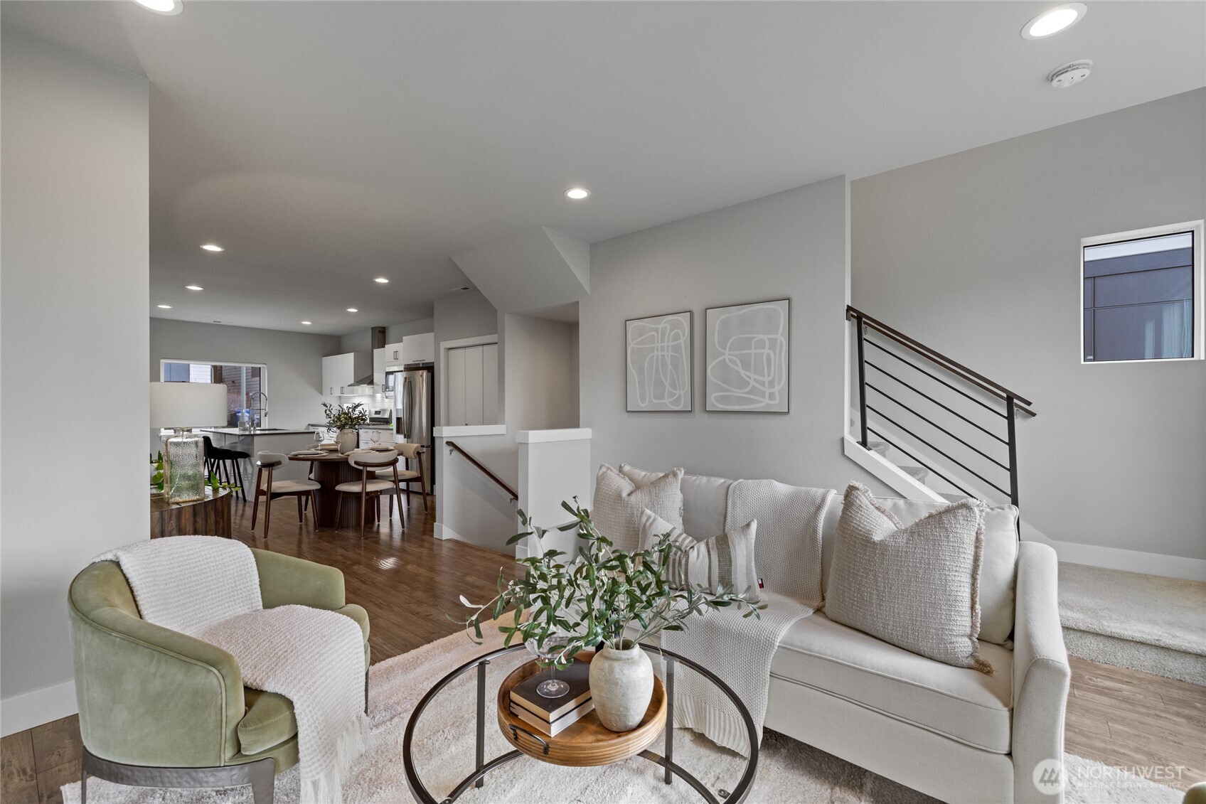 24903 123rd Place Southeast Kent, WA 98030 - Photo 17 of 40 a living room with furniture and a view of kitchen