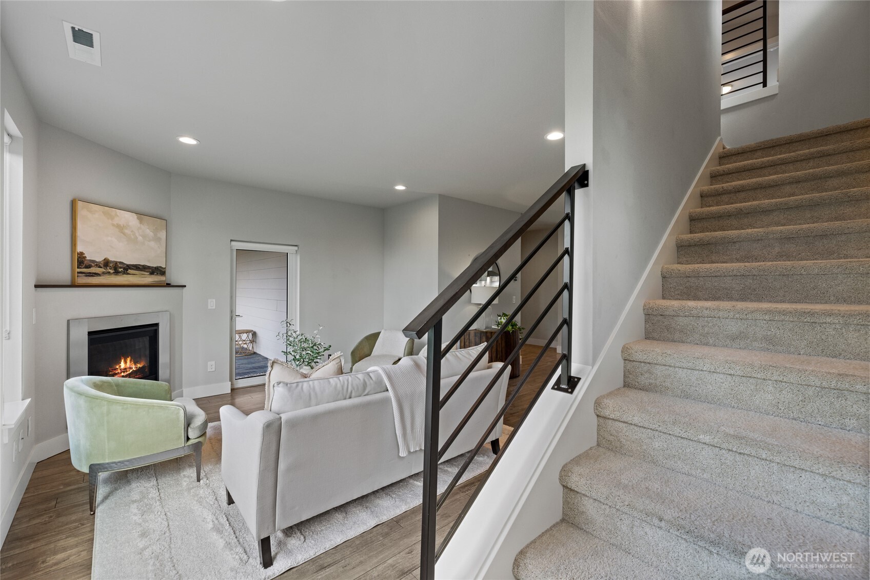 24903 123rd Place Southeast Kent, WA 98030 - Photo 18 of 40 a living room with furniture and a fireplace