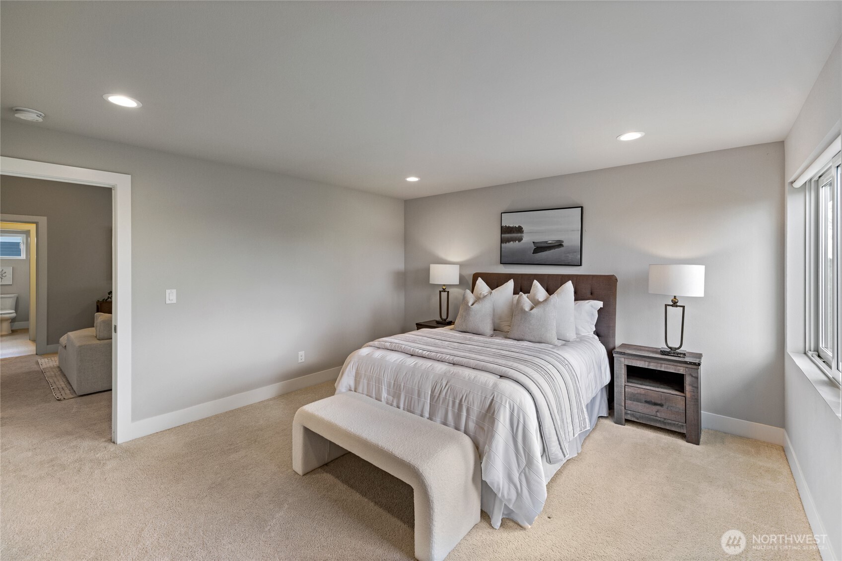 24903 123rd Place Southeast Kent, WA 98030 - Photo 23 of 40 a bedroom with a bed and a walk in closet