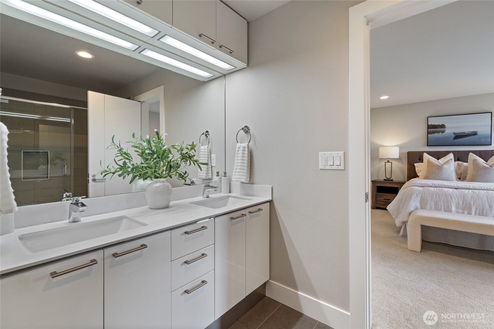 24903 123rd Place Southeast Kent, WA 98030 - Photo 28 of 40 a en suite bathroom with a sink and a mirror