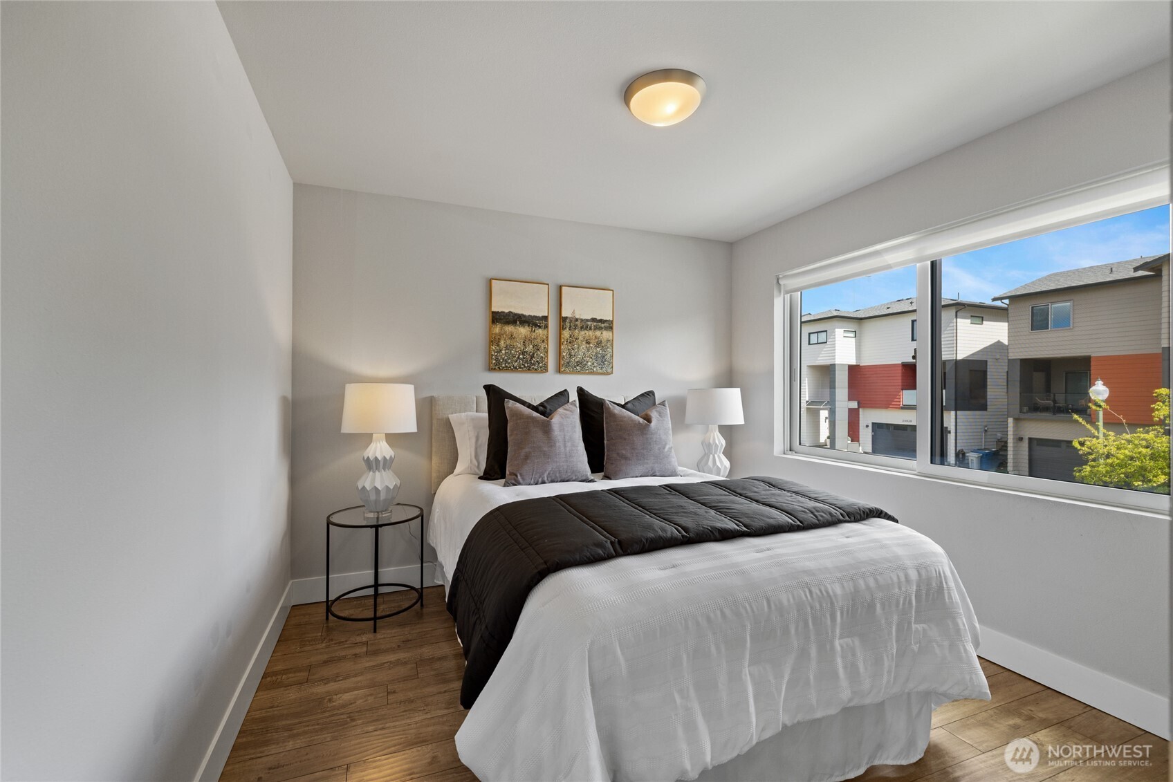 24903 123rd Place Southeast Kent, WA 98030 - Photo 29 of 40 a bed room with a bed and a large window