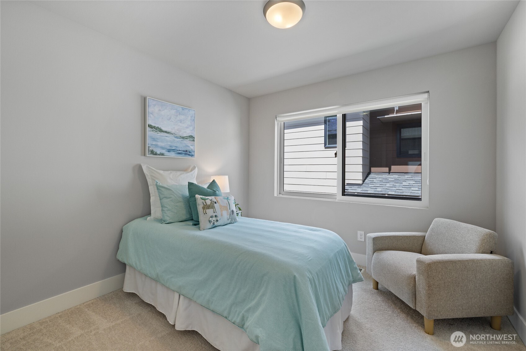 24903 123rd Place Southeast Kent, WA 98030 - Photo 32 of 40 a bedroom with a bed couch and window