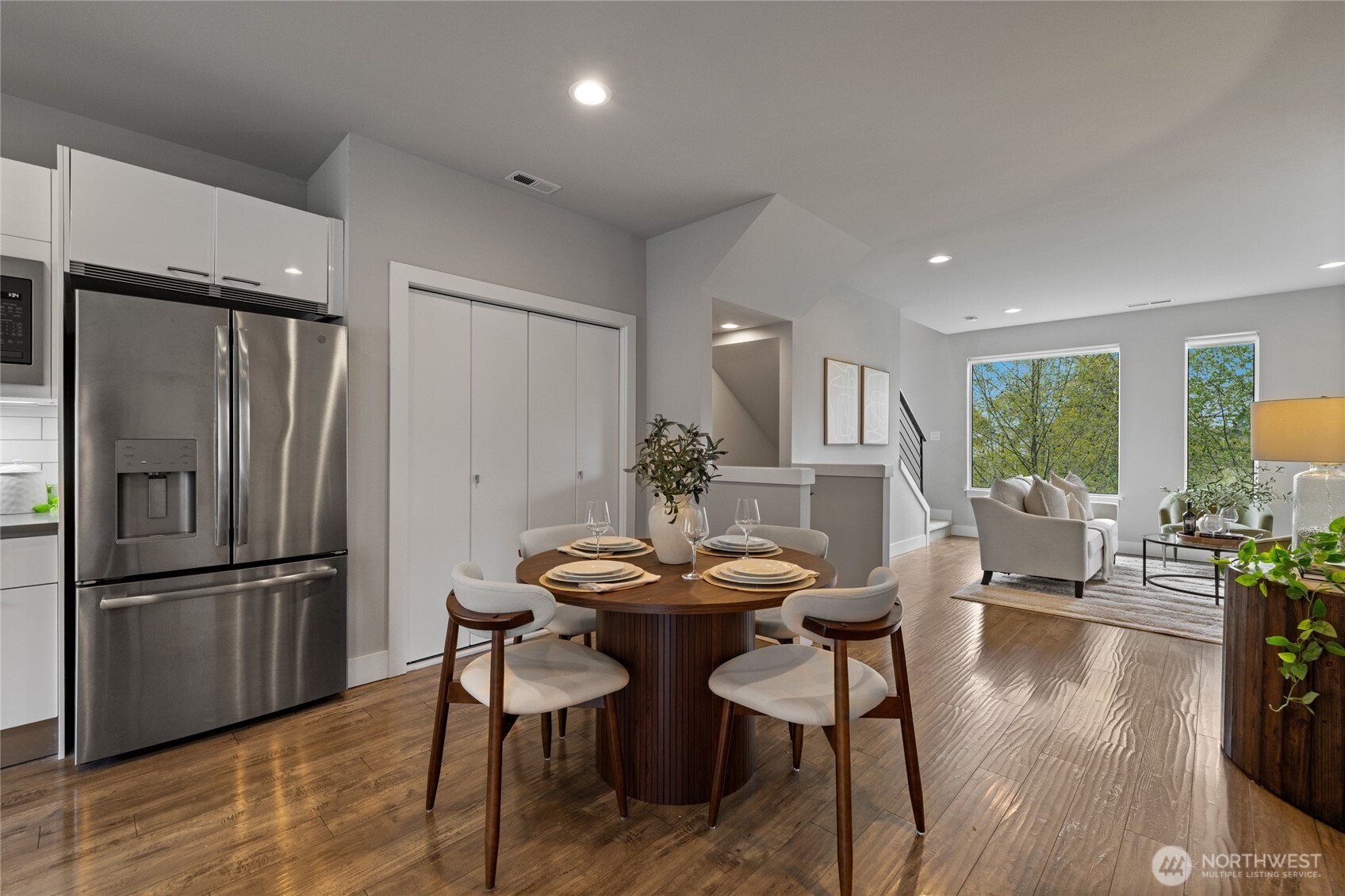 24903 123rd Place Southeast Kent, WA 98030 - Photo 9 of 40 a view of a dining room with furniture window and wooden floor